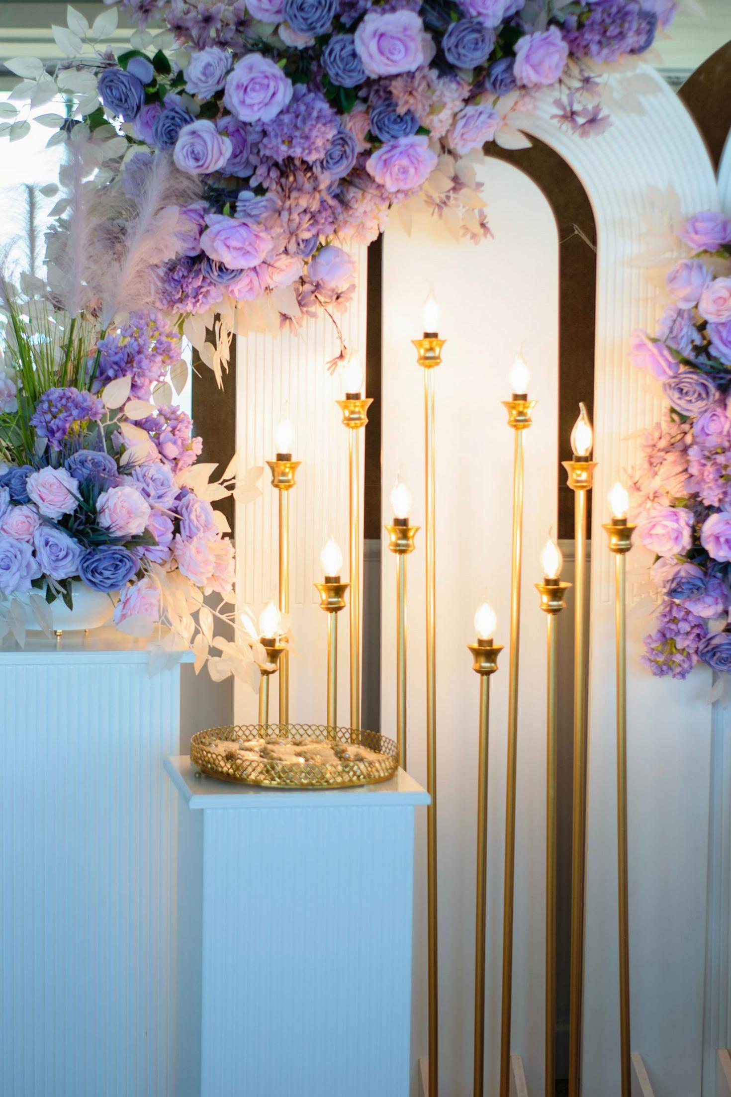 Purple candles and flowers